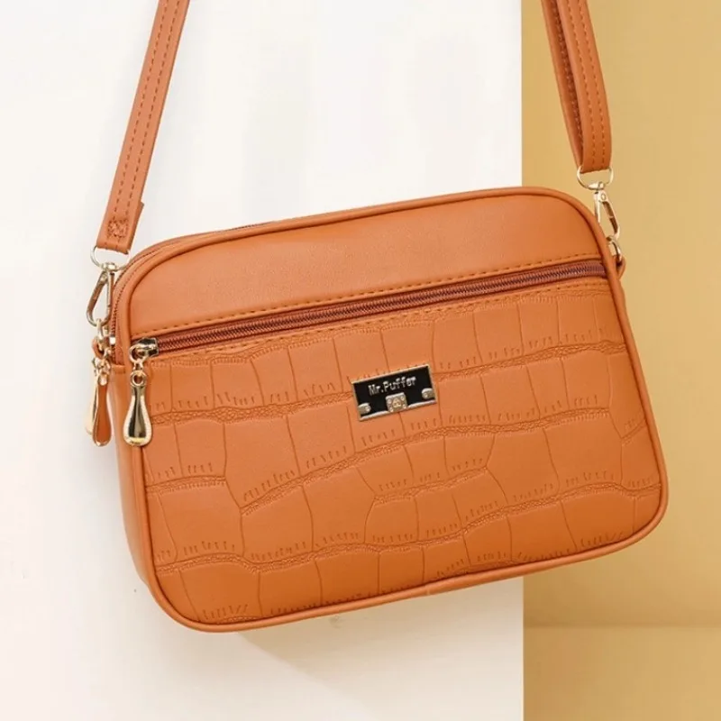 🔥👜Nová módnà dámská crossbody kabelka 2025 brzy na jaře ---velká kapacita, jednoduchý styl, nastavitelný ramennà popruh