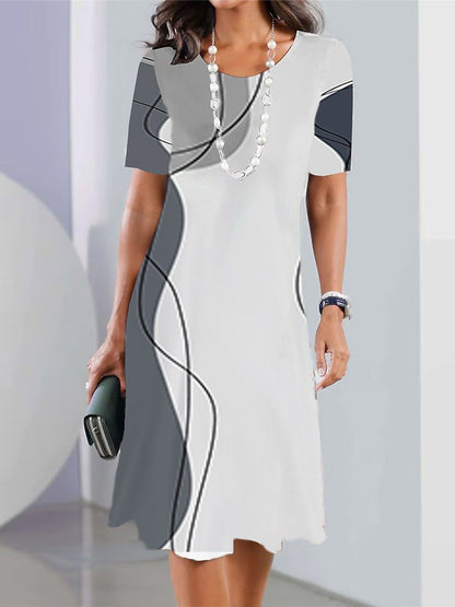 🔥【Jarní výprodej】👗【XS-5XL】Sexy šaty 2025 s potiskem a kulatým výstřihem pro ženy