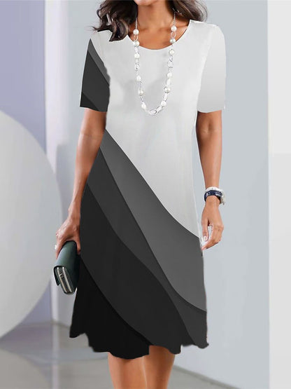 🔥【Jarní výprodej】👗【XS-5XL】Sexy šaty 2025 s potiskem a kulatým výstřihem pro ženy