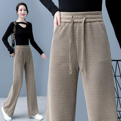 👖【40–110 kg】🔥【Kupite eno, dobite eno brezplačno】✅Nove žametne hlače s širokimi hlačnicami, zelo udobne za nošenje.